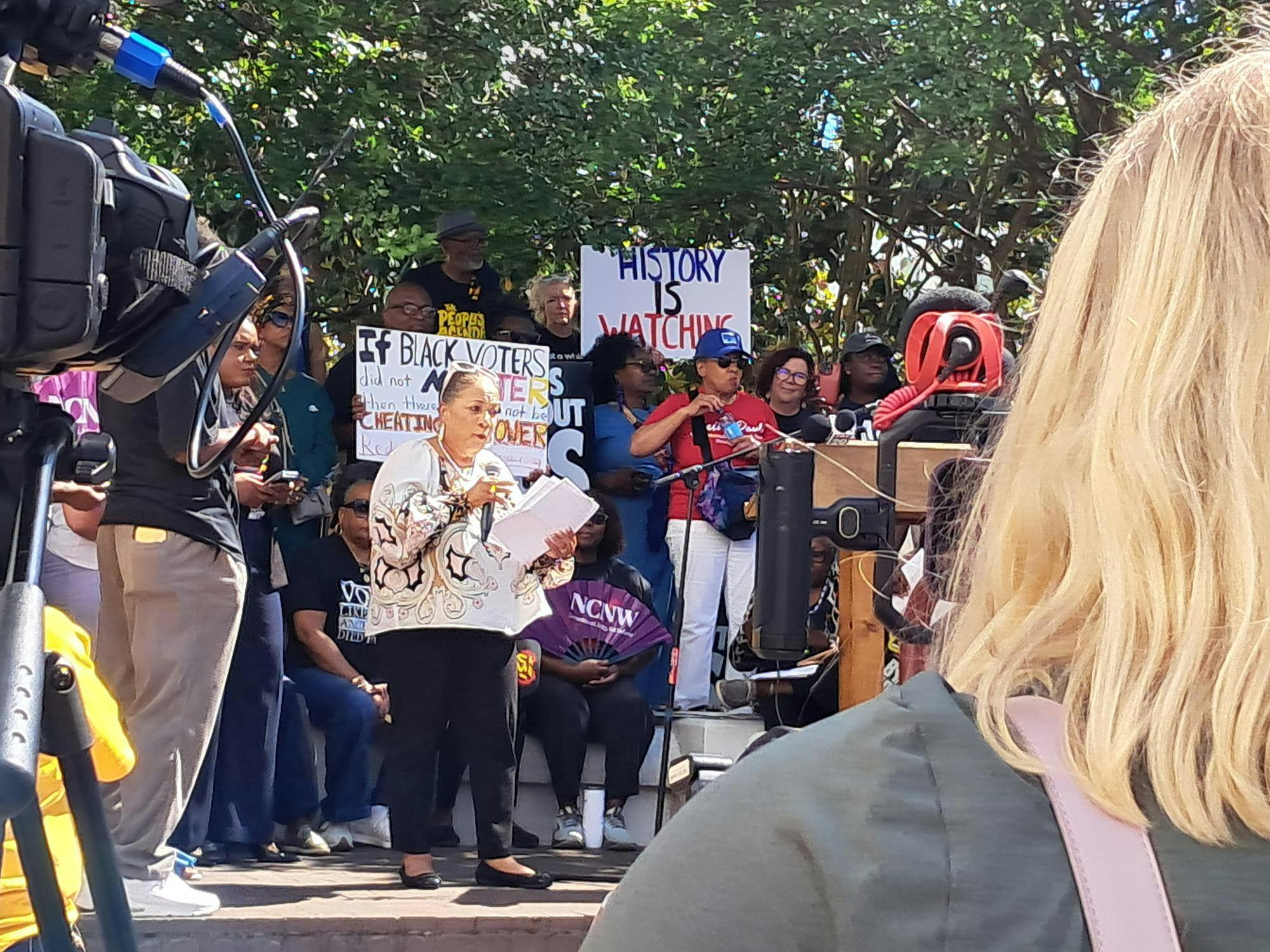 Sheyann Webb-Christburg speaks at the rally outside the State House on May 4, 2026.