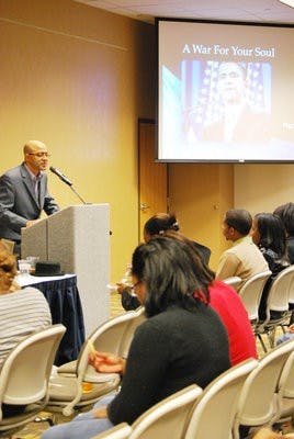 Reginald Bullock speaks to the crowd about his film. Carolyn Rush/ ASSISTANT PHOTO EDITOR