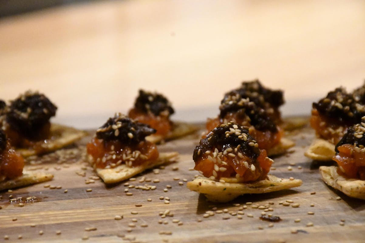 Gulf-Yellowfin Tuna Nachos prepared by Chef David Bancroft at the Children’s Table event on Tuesday, March 3, 2026.