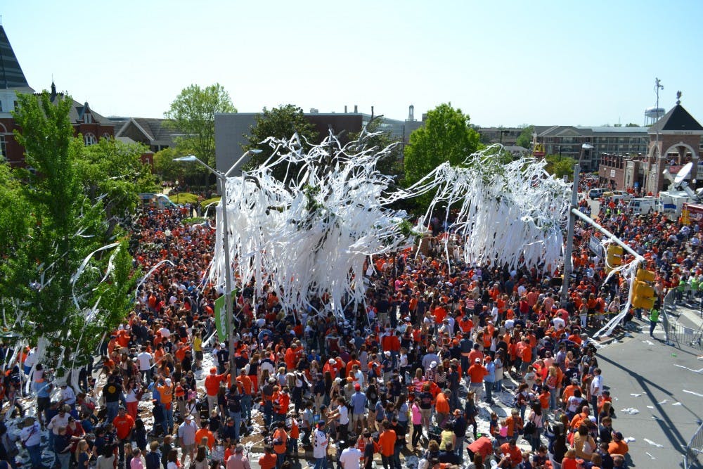 Toilet paper hangs thick from the branches of the Toomer's Corner oak trees after the A-Day game.
*Taken from the balcony of Ware Jewelers.
Raye May / PHOTO EDITOR