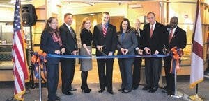 The ribbon is cut at Foy, where ROT C members and other members of the community toured the new Veteran's Resource Center during the grand opening Tuesday, Nov. 13. (Danielle Lowe / ASSISTANT PHOTO EDITOR)