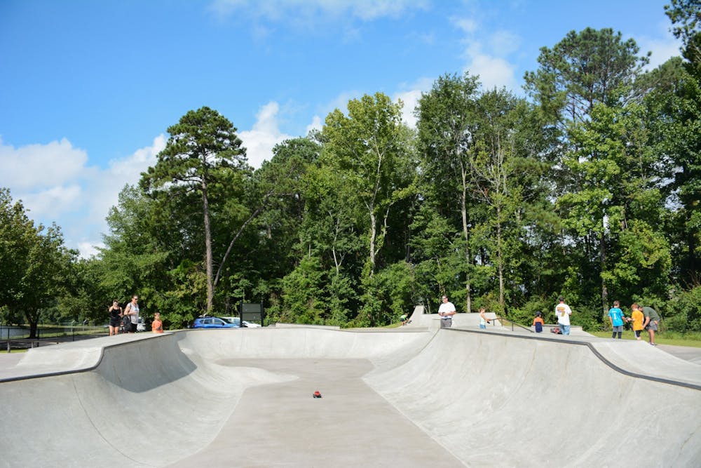 <p>Families approach the Auburn-Opelika Skate Park in preparation for the RC Car Skate Park Takeover on Saturday, Aug. 28, in Auburn, Ala.</p>
