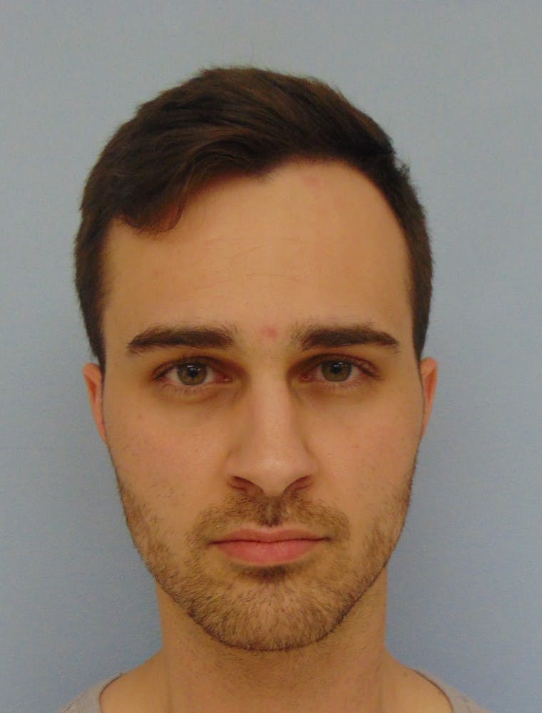 Andrew Benjamin Cantley, 24, was arrested by Auburn police, charged with producing and possessing child pornography.&nbsp;