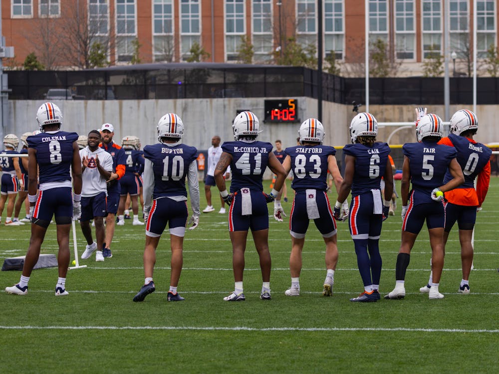 Members of the wide receiver room line up for drills during spring practice on on February 27, 2024