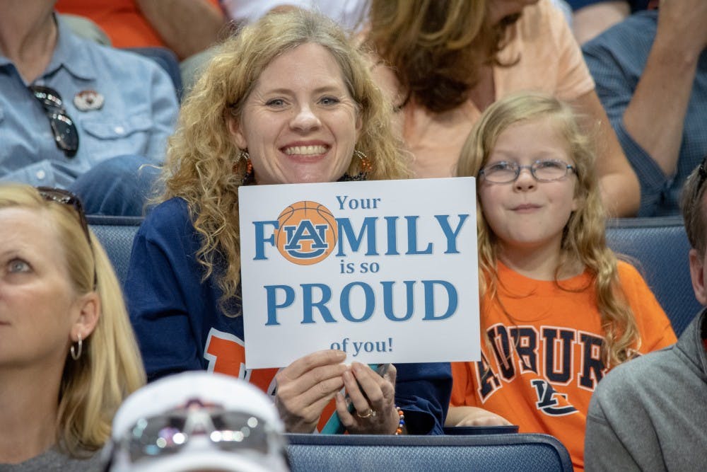 Auburn fans smile during the teams welcome home from the Final Four on Sunday, April 7, 2019, in Auburn, Ala.
