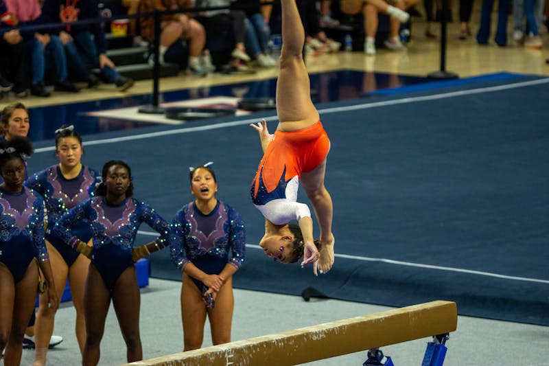 Dec. 3, 2021; Suni Lee does a routine on beam while participating in a preview meet from Auburn Arena in Auburn, Ala.