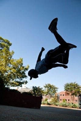 Ryan Doyle performs his gravity-defying parkour stunts on Auburn's campus Friday. (CONTRIBUTED)
