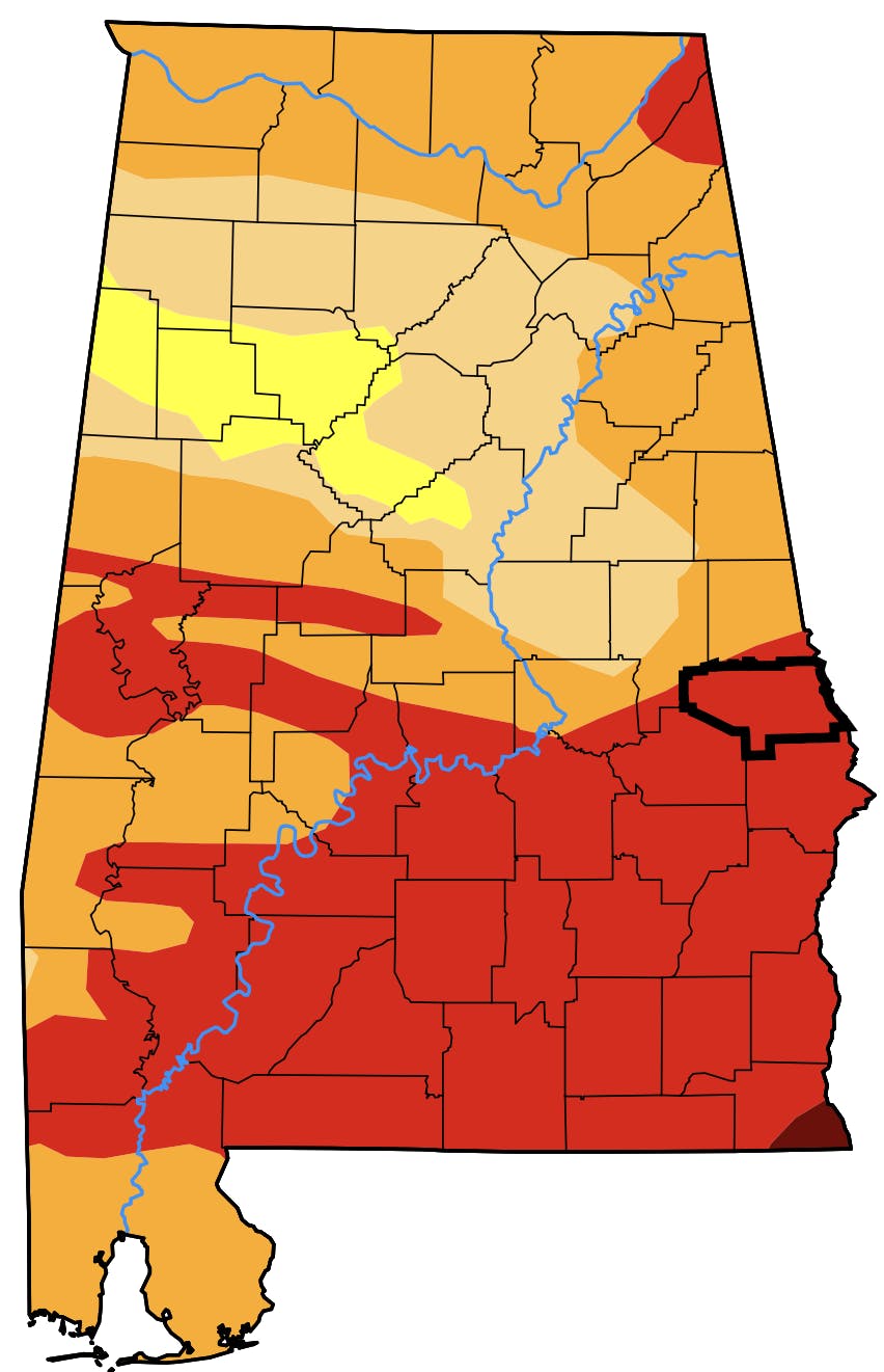 A Drought Monitor of Alabama showing varying shades of orange, yellow, and red.