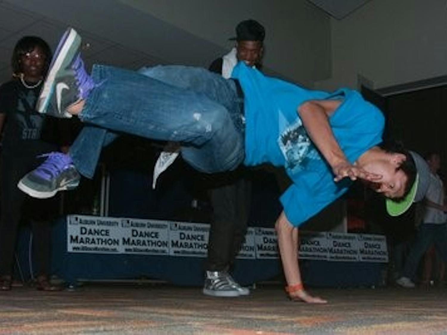 Vincent Tsai, sophomore industrial design, break dances at the AU Dance Marathon. Philip Smith / ASSISTANT PHOTO EDITOR