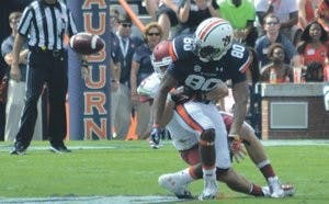 Wide receiver Emory Blake loses the ball in the second quarter of Auburn's 24-7 loss at home against Arkansas. Turnovers have been the deciding factor in games this season, and the team ranks second-to-last nationally in turnovers lost. (Danielle Lowe / ASSISTANT PHOTO EDITOR)