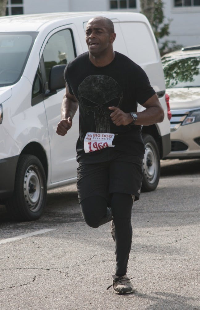 Aladin Sidahmed winning at the 2016 Superhero Opelika 5k on Saturday, Apr., 30 in Opelika Ala.