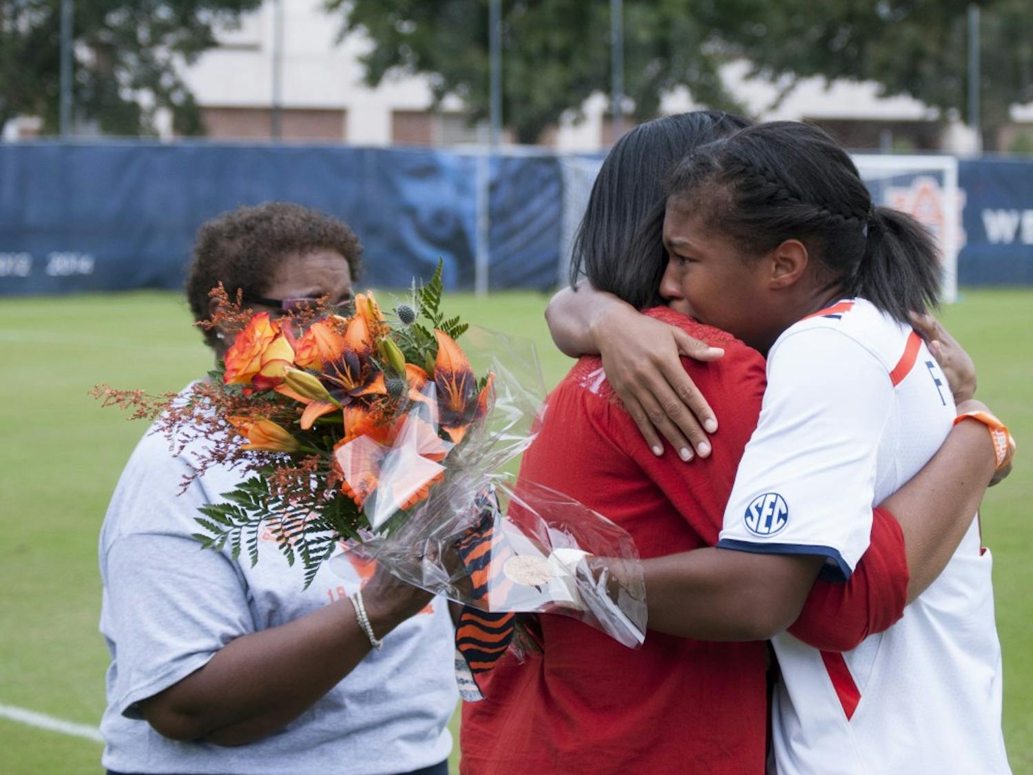Kala Faulkner, senior defender, hugs her mother during Senior Day before the Auburn's match against the Georgia Bulldogs at the Auburn Soccer Complex on Sunday, Oct. 25.