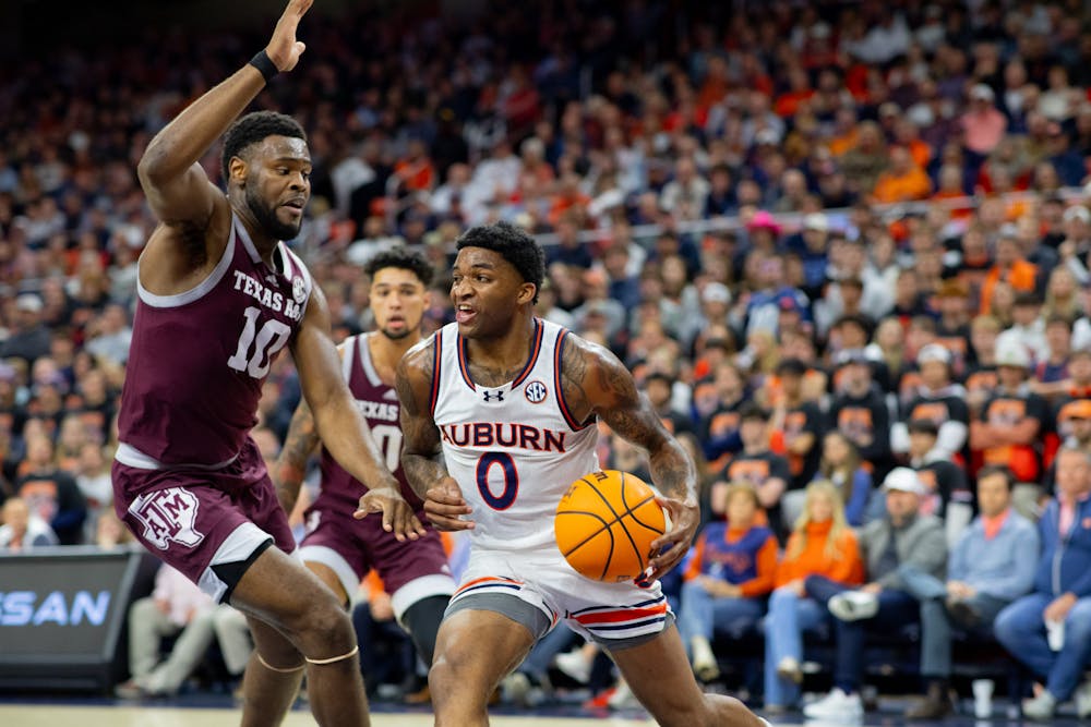 Auburn guard KD Johnson drives to the basket against Texas A&M on January 9, in Neville Arena. 