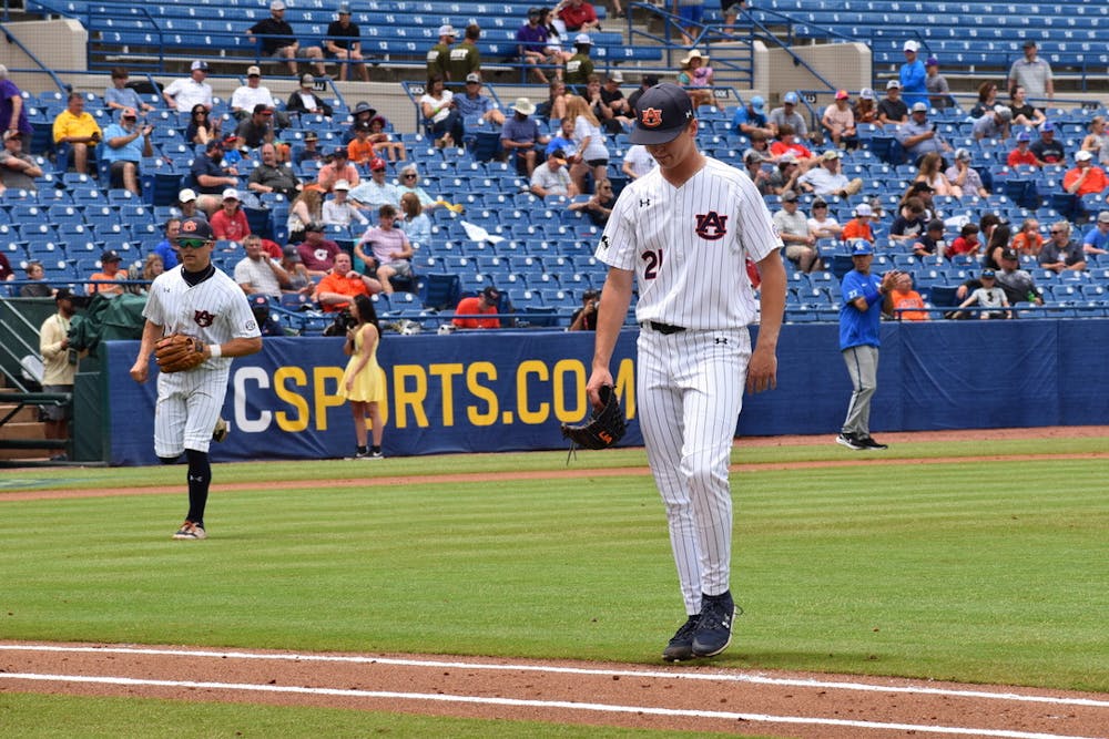 <p>Trace Bright heads to the Auburn dugout during the SEC Tournament in Hoover, Ala.&nbsp;</p>