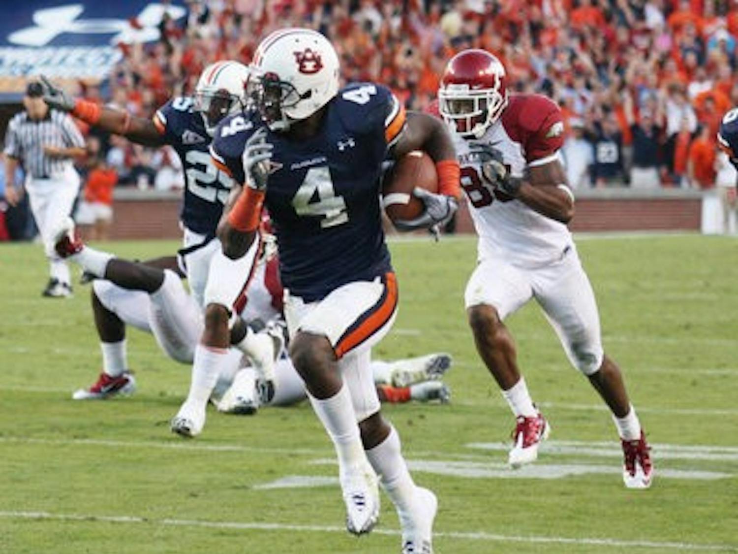 Senior Zac Etheridge recovers a fumble for an Auburn touchdown. (Emily Adams/PHOTO EDITOR)