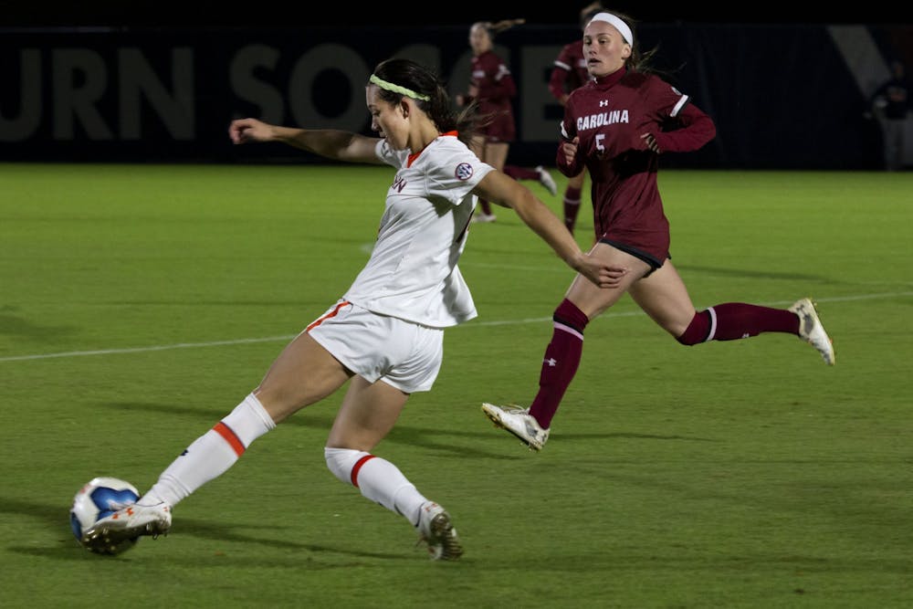 <p>Sydney Richards (14) kicks the ball during the Auburn Women's soccer game against South Carolina on Oct. 31, 2019, in Auburn, Alabama.</p>
