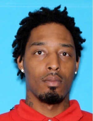Moses Marques Edwards, 32, was identified by the Opelika Police Department as a murder suspect.