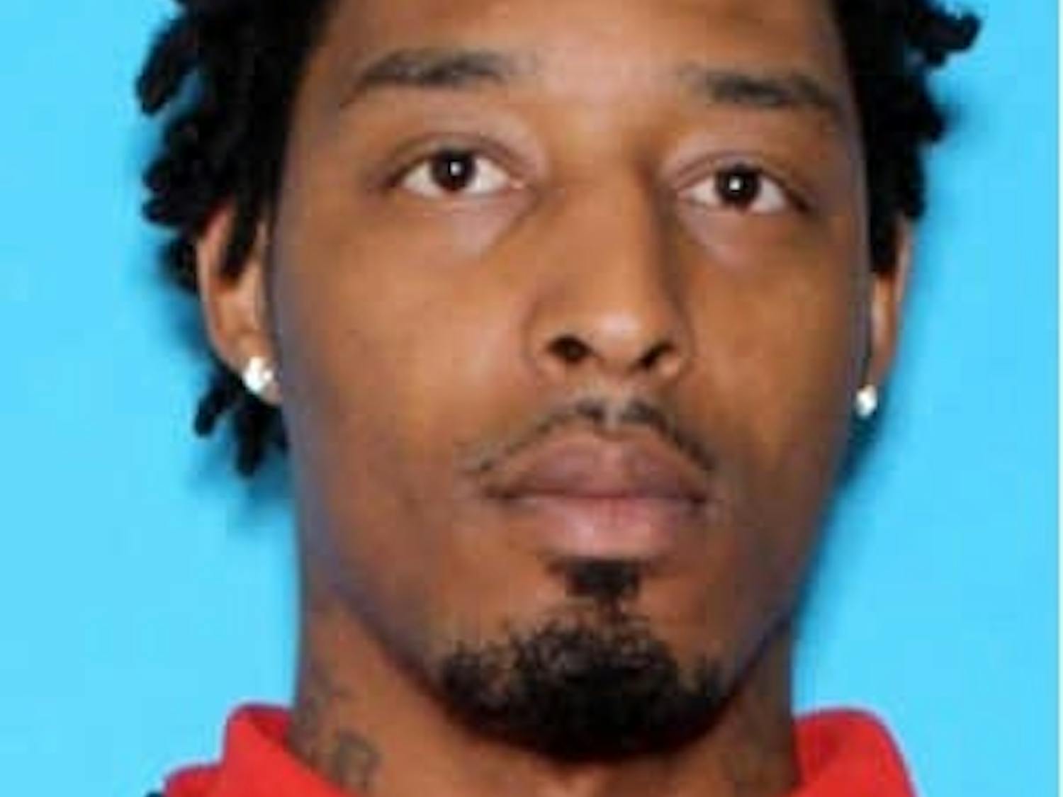 Moses Marques Edwards, 32, was identified by the Opelika Police Department as a murder suspect.