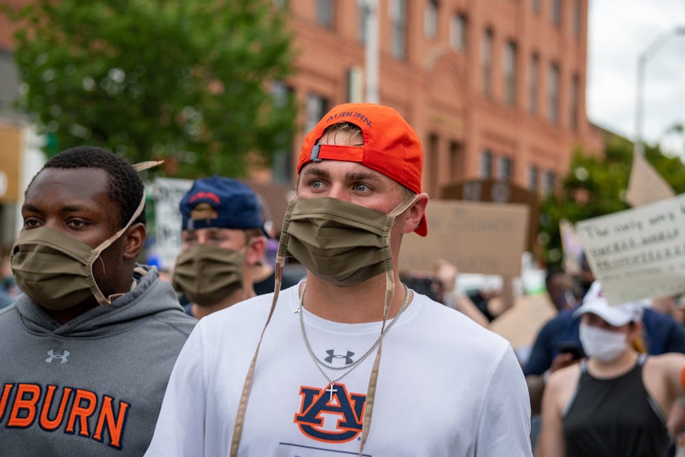Bo Nix marches in the Auburn Protest against Police Brutality, on Sunday, June. 7, 2020, in Auburn, Ala.