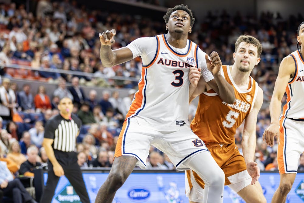 <p>KeShawn Murphy (#3) fights with a Texas player for a rebound during the basketball game in Neville Arena on January 28 2026.</p>