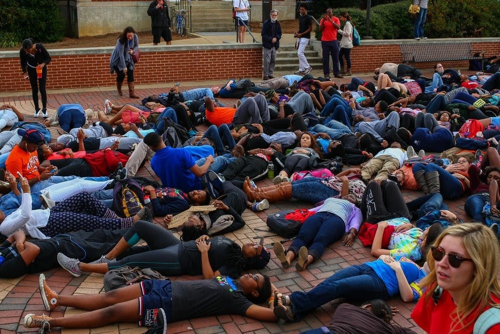 Emily Klitzke (#5) jumping up to hit the ball. (Kenny Moss | Photographer)