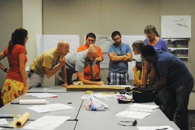 Elaine Busby / Assistant PHOTO EDITOR

The Land Ethics and Environmental Responsibility class looks over plans for the Donald E. David Arboretum.