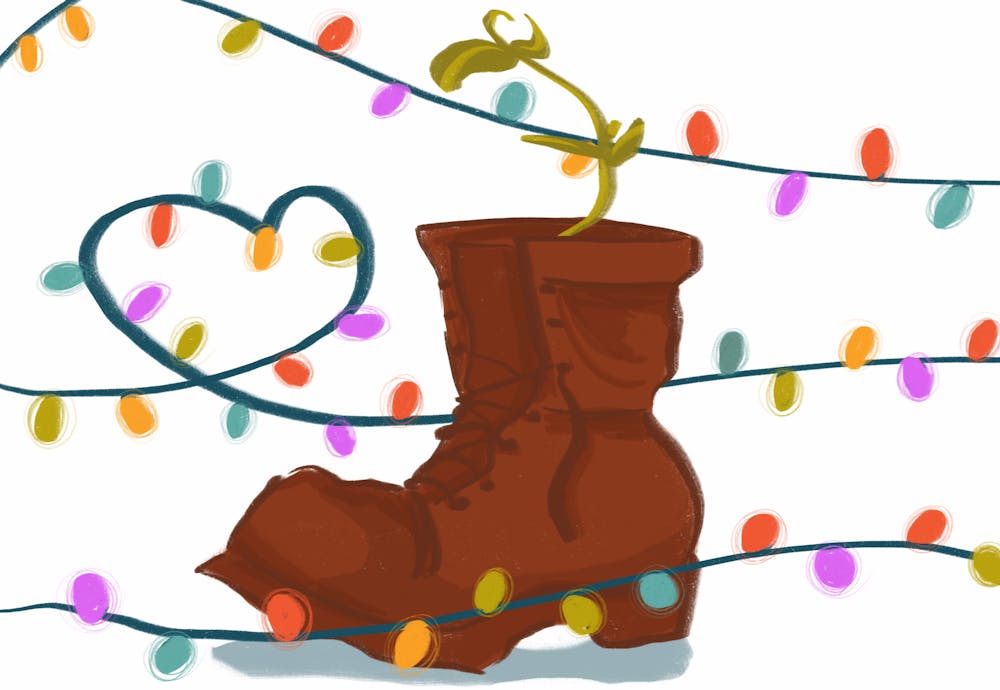 <p>A green plant grows inside an old dirty boot, and the scene is surrounded by bright, colorful string lights.</p>