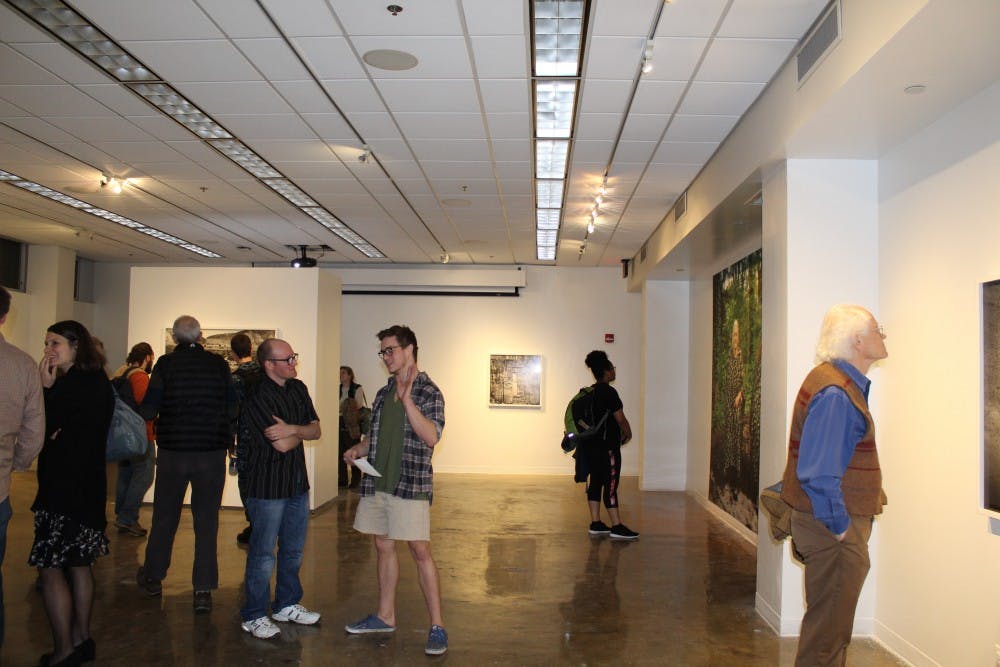  Auburn students and locals view Pride and Pestilence by Jeff Whetstone&nbsp;on Thursday, Feb. 1, 2018 in Auburn, Ala.