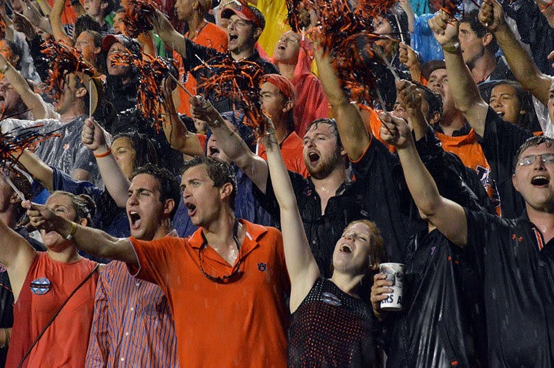 Students cheering during Auburn vs Arkansas football game on August 30, 2014. (Emily Enfinger | Assistant Photo Editor)