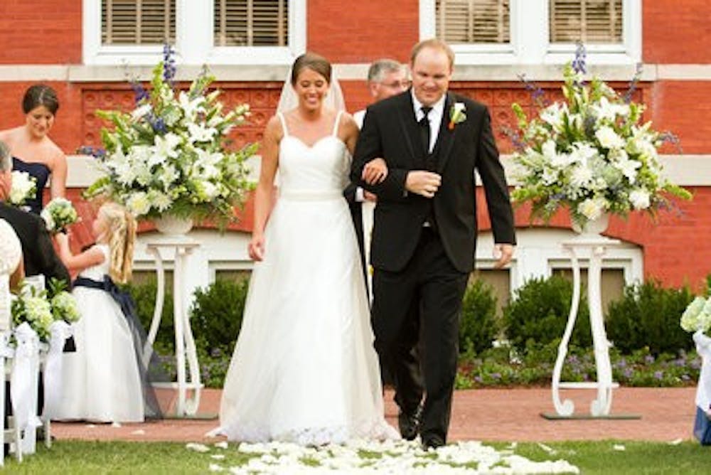 Slade and Katie Ponder, both Auburn alumni, wed on Samford lawn on May 26. (Courtesy of FlipFlopFoto)