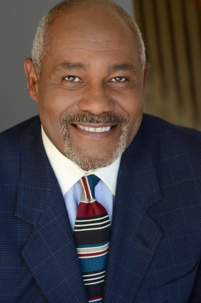 thumbnail_Thom Gossom Head Shot.jpg