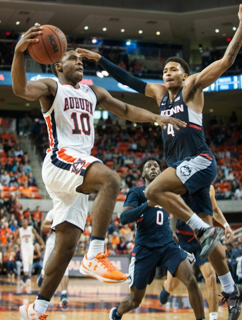 <p>Davion Mitchell (10) looks to take the ball to the basket in the second half. Auburn vs UConn on Saturday, Dec. 23 in Auburn, Ala.</p>
