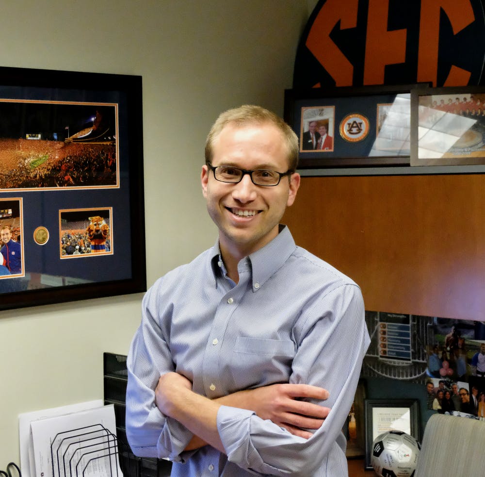 Brad Smith poses for picture 