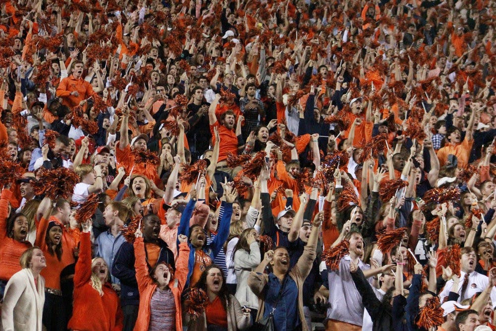 Auburn students are ecstatic during the final Auburn touchdown of the game against Georgia on November 16, 2013. (Jenna Burgess / ASSOCIATE PHOTO EDITOR)