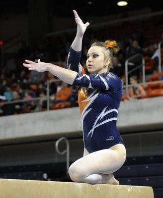 Auburn's Caitlin Atkinson competes on the beam against LSU  Friday, Feb. 22. (Courtesy of Todd Van Emst)