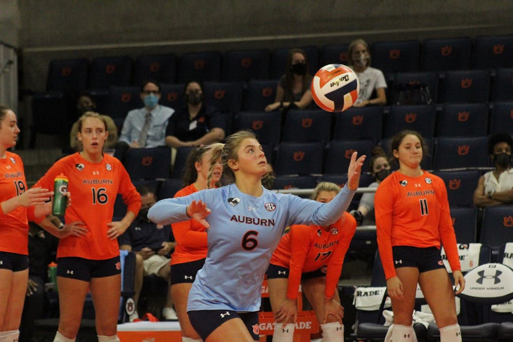 <p>Bella Rosenthall serves the ball in a match against North Alabama on Sept. 9, 2021, at Auburn Arena in Auburn, Alabama.</p>