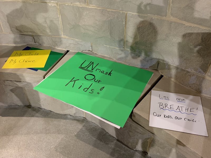 Many parents brought signs to protest the Auburn City Board of Education's decision with slogans like "Unmask Our Kids!" and "My Child My Choice."