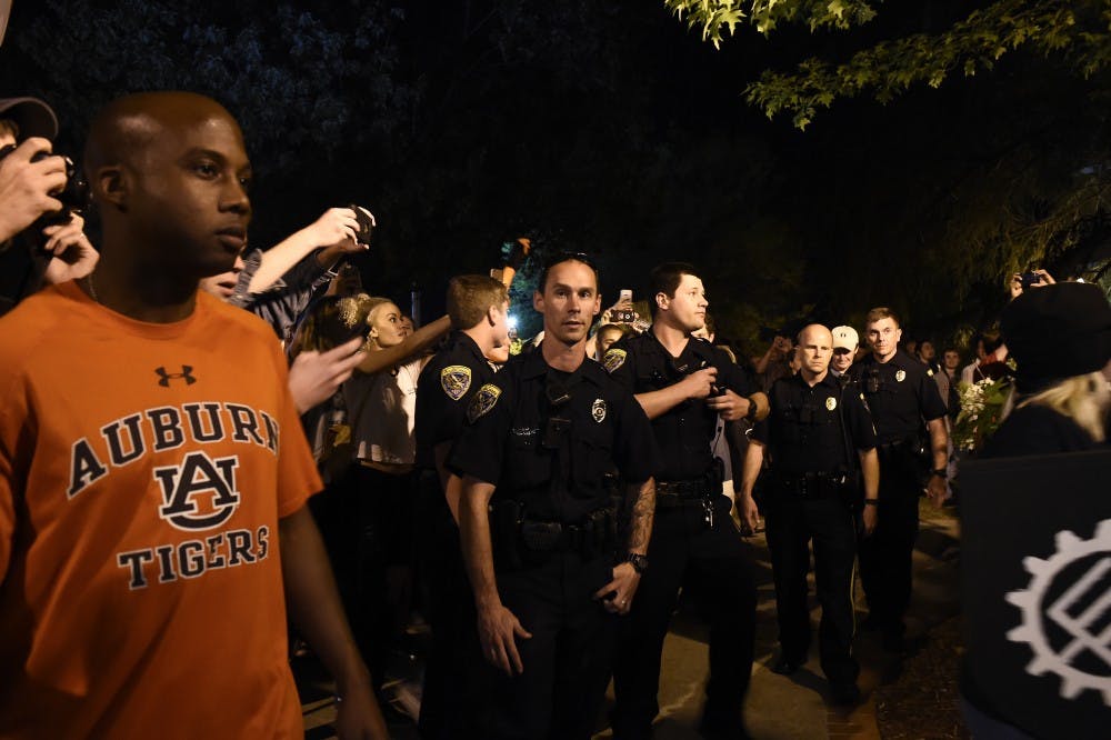 Protesters fill Thach Avenue near South College Street after alt-right leader Richard Spencer's talk on Tuesday, April 18, 2017 in Auburn, Ala. 