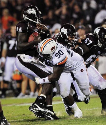 Auburn's Nick Fairley sacks Mississippi State quarterback Chris Relf in the second half Thursday, Sept. 9, 2010 in Starkville, Miss. (Todd Van Emst / AUBURN MEDIA RELATIONS)
