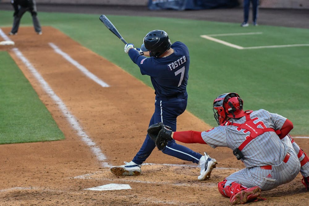 Auburn shortstop Cole Foster (7) swings during the home opener against Indiana in Plainsman Park on Feb. 17, 2023.