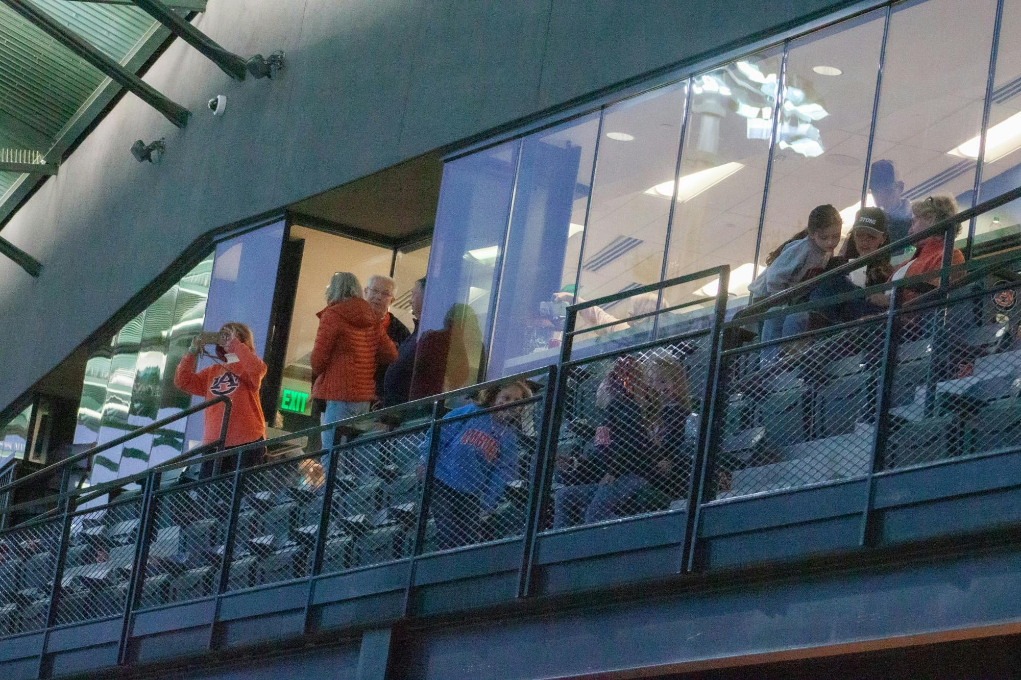 Fans enjoying the newly renovated broadway club seating at Plainsman Park on Friday, February 14, 2025