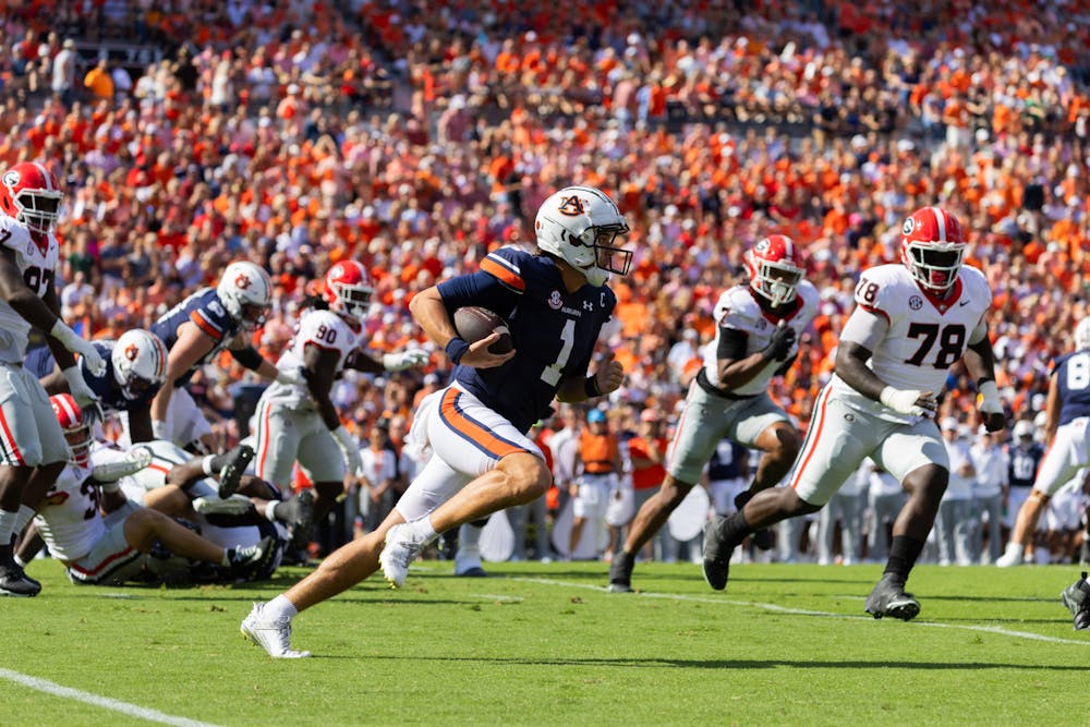 Payton Thorne takes off downfield early in the first quarter of Georgia at Auburn