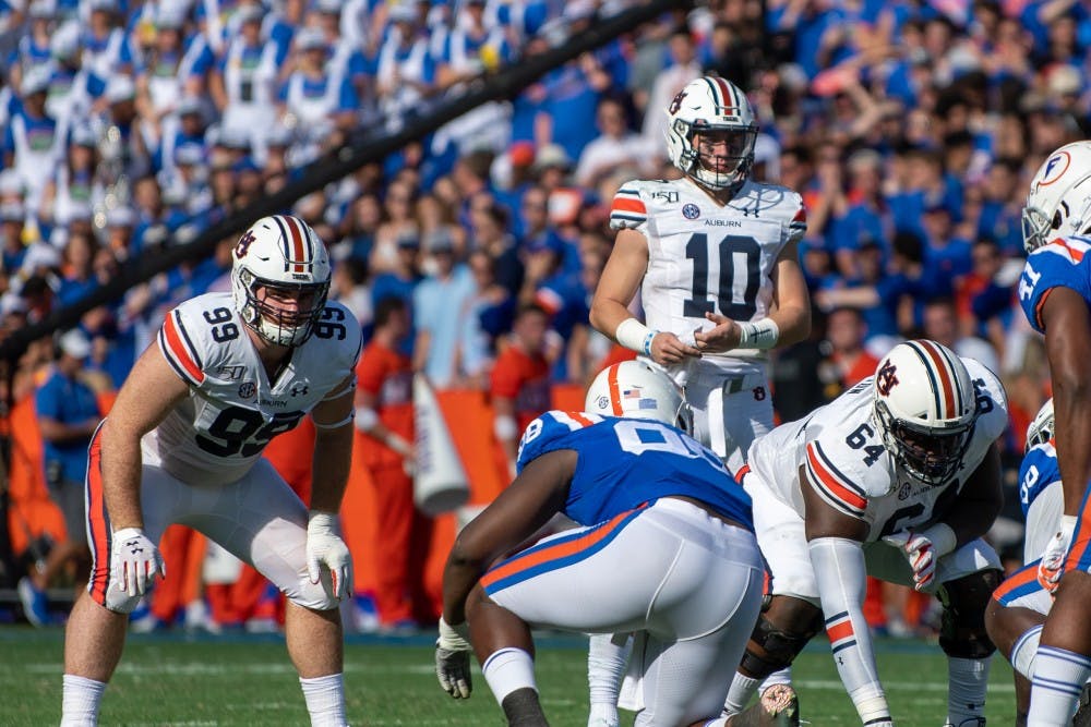 <p>Bo Nix (10) prepares to snap the ball during Auburn vs. Florida, on Saturday, Oct. 5, 2019, in Gainesville, Fla.</p>