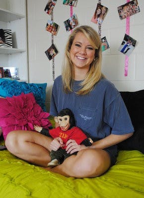 Leigh Andrews holds her 45-year-old stuffed animal Zip she received from her mother when she was born. (Maria Iampietro / PHOTO EDITOR)