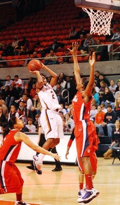 Junior guard Morgan Jennings pulls up for a jump shot against Ole Miss Thursday night. (Tim Simpson / PHOTO STAFF)