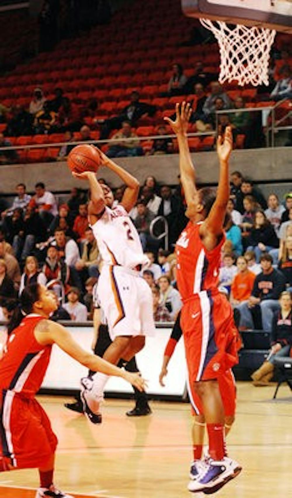 Junior guard Morgan Jennings pulls up for a jump shot against Ole Miss Thursday night. (Tim Simpson / PHOTO STAFF)