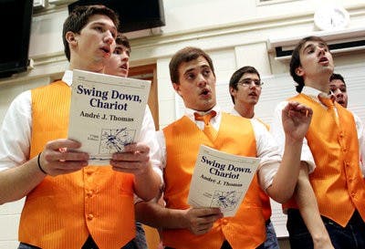 AU Cappella practices "Swing Down, Chariot" for the upcoming show. (Emily Adams / Photo Editor)