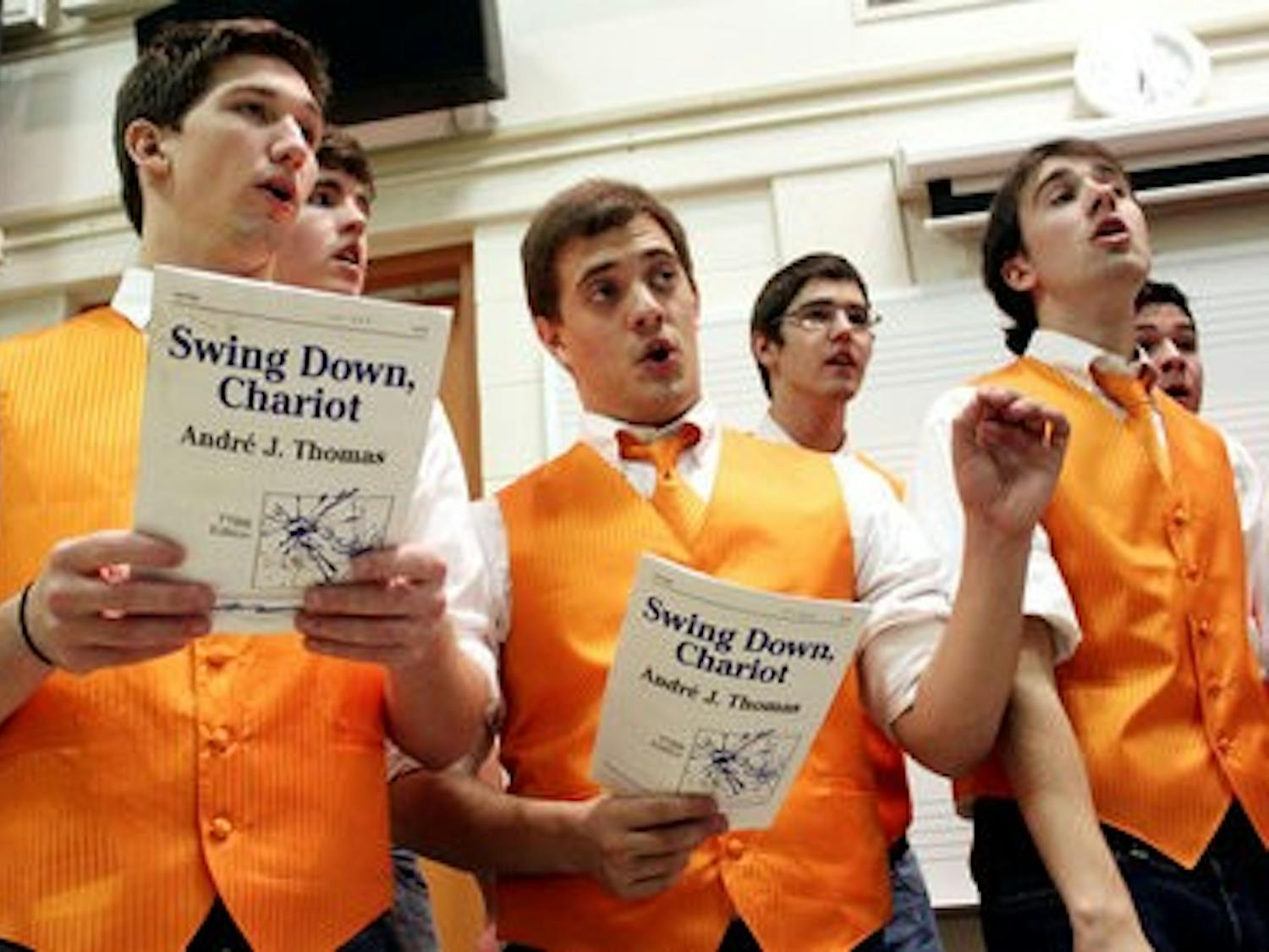 AU Cappella practices "Swing Down, Chariot" for the upcoming show. (Emily Adams / Photo Editor)