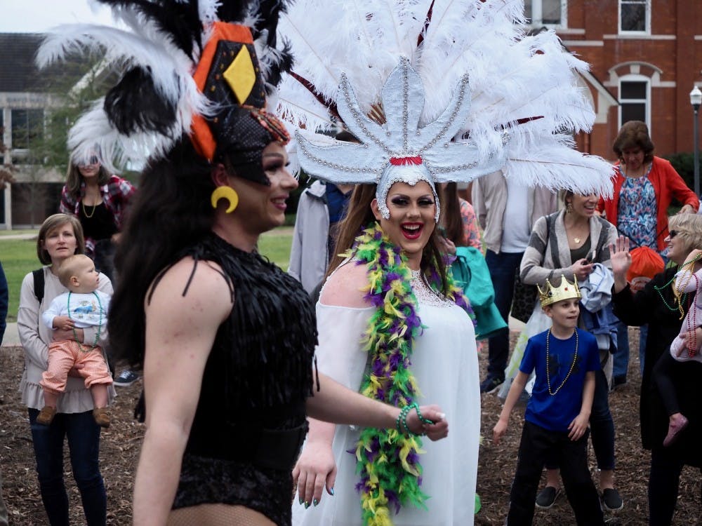 Drag Queens with Pride on the Plains celebrate Mardi Gras at the Auburn Mardi Gras Parade on Sat, Mar. 2, 2019 in Auburn, Ala.