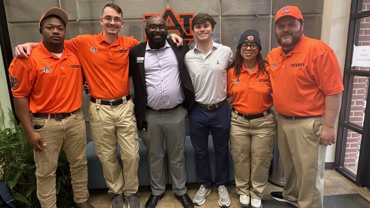 Some members of the security team stand with SGA President Owen Beaverstock (third from right)